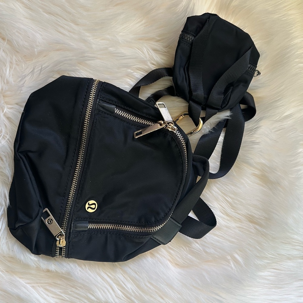 Lululemon Athletica Black Backpack with Gold Accents
